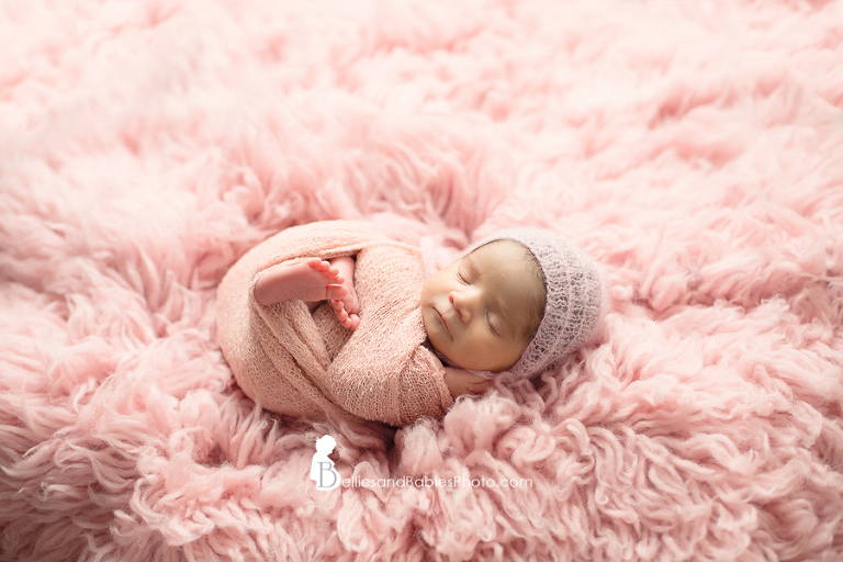 Newborn Photographer Ashburn Northern VA in studio newborn pictures baby girl in pink