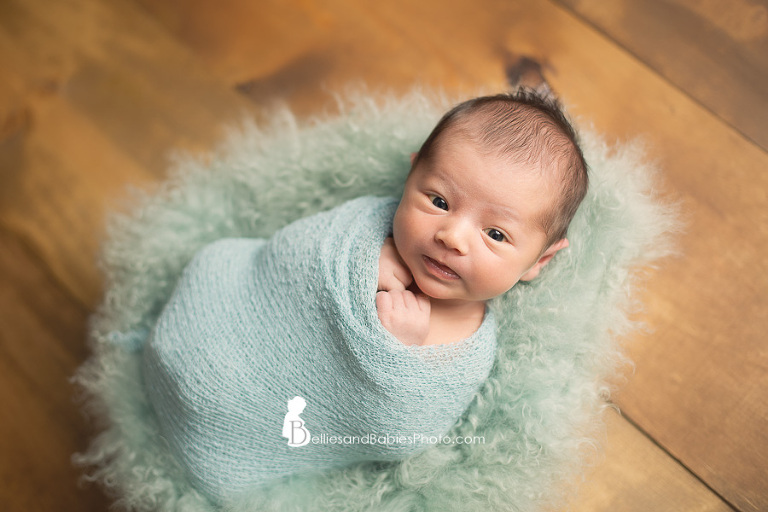 Newborn baby pictures in Northern VA baby in blue basket