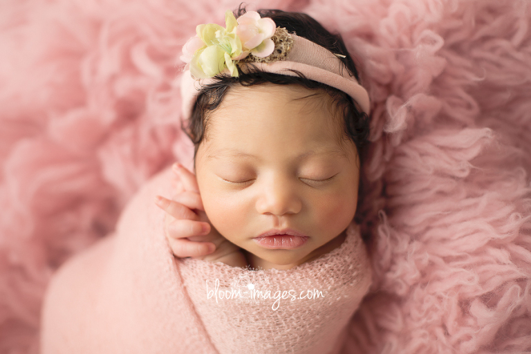 newborn baby girl in pink