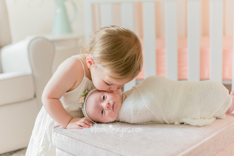 Baby sisters kissing, Newborn photographer in Northern VA
