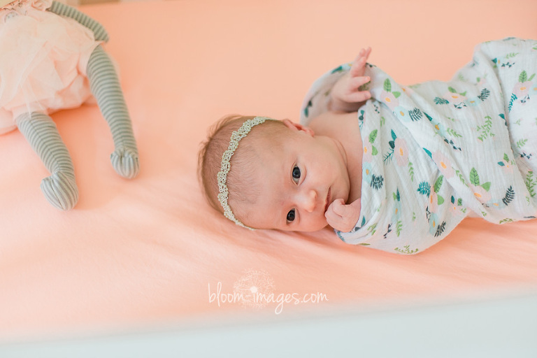 Infant baby in the crib, Lifestyle newborn session in Northern VA