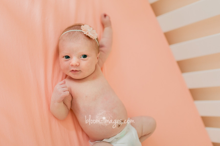 Baby in the crib, at home newborn photo session in Northern VA